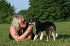 woman with mongrel puppy