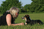 woman with mongrel puppy