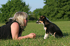 woman with mongrel puppy
