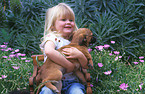 girl with puppy