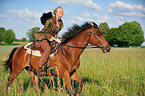 woman rides horse