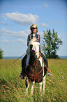 woman rides horse