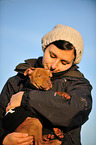 woman with young Pitbull-mongrel