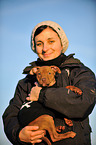 woman with young Pitbull-mongrel