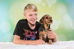 boy and Dachshund-Mongrel Puppy