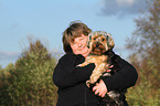 woman and Yorkshire-Terrier-Mongrel