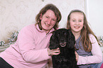 woman, girl and Cocker-Spaniel-mongrel