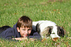boy and Caucasian-Shepherd-Dog-Mongrel