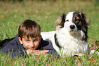 boy and Caucasian-Shepherd-Dog-Mongrel