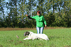 woman and Caucasian-Shepherd-Dog-Mongrel