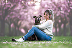 woman with American-Staffordshire-Terrier-Mongrel