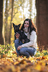 woman and Chihuahua-Yorkshire-Terrier