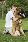 boy with german shepherd