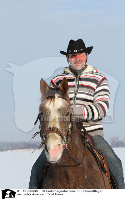 man rides American Paint Horse / SS-26538