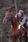 woman rides American Saddlebred Horse
