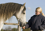 woman and Andalusian horse