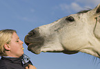 woman and Andalusian horse