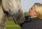 woman and Andalusian horse