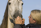 woman and Andalusian horse