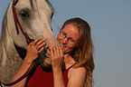 woman and arabian horse