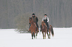 2 riders with horse