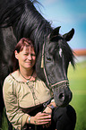 woman and arabian horse