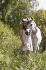 woman and arabian horse