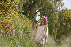 woman and arabian horse