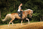 woman rides crossbred