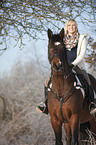 woman with bavarian warmblood