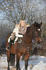 woman with bavarian warmblood