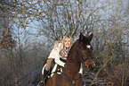 woman with bavarian warmblood