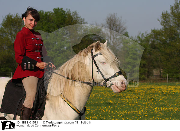 woman rides Connemara-Pony / BES-01571