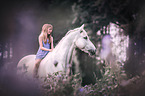 girl sits at Connemara Pony