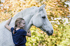 Connemara Pony with a child