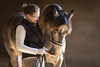 woman and Connemara-Pony