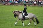 woman rides horse