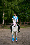 woman rides KWPN