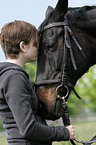 woman and english thoroughbred