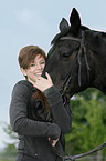 woman and english thoroughbred