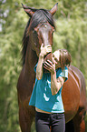 woman and english thoroughbred