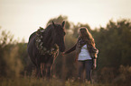 woman with english thoroughbred