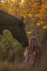 woman with english thoroughbred