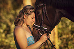 woman with english thoroughbred