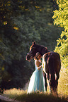 woman with english thoroughbred