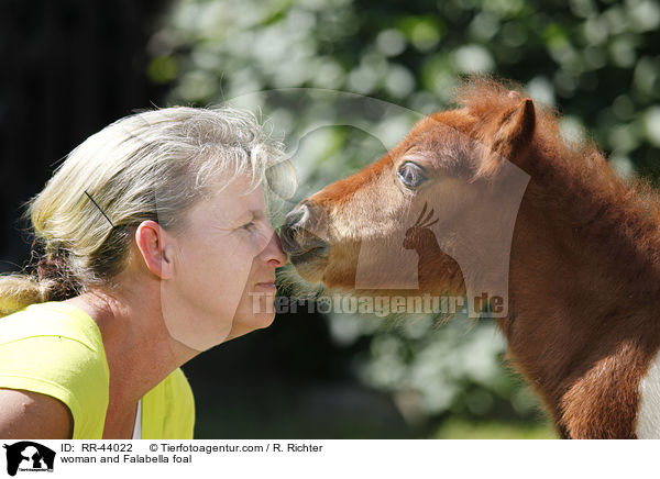 woman and Falabella foal / RR-44022