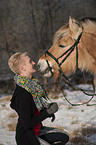 woman with Fjord horse