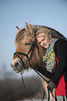 woman with Fjord horse
