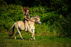 woman rides Fjordhorse