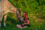 woman and Fjordhorse